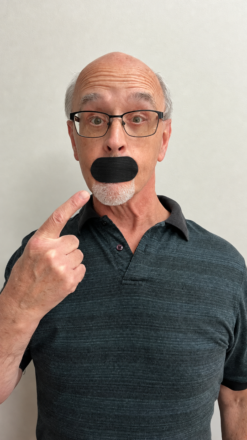 Man wearing black Reviva mouth tape