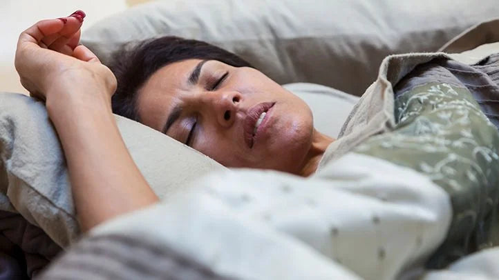 Woman sleeping with her mouth open
